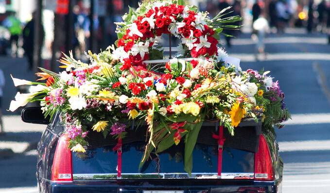 Flowers on funeral car