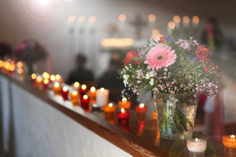 chapel of rest with candles and flowers
